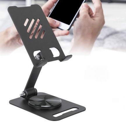 Black foldable stand with a person holding a smartphone in the background