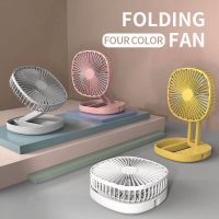 Four folding fans in gray, pink, white, and yellow, displayed partially folded and extended