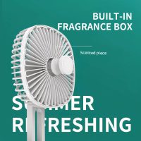 Close-up of a white fan highlighting the built-in fragrance box at the front