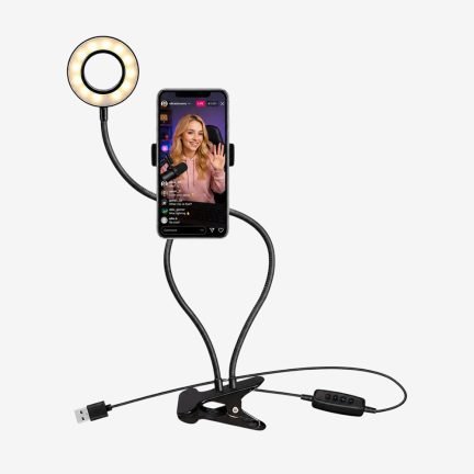 Black clamp base with dual gooseneck arms holding a smartphone and an illuminated selfie ring light.