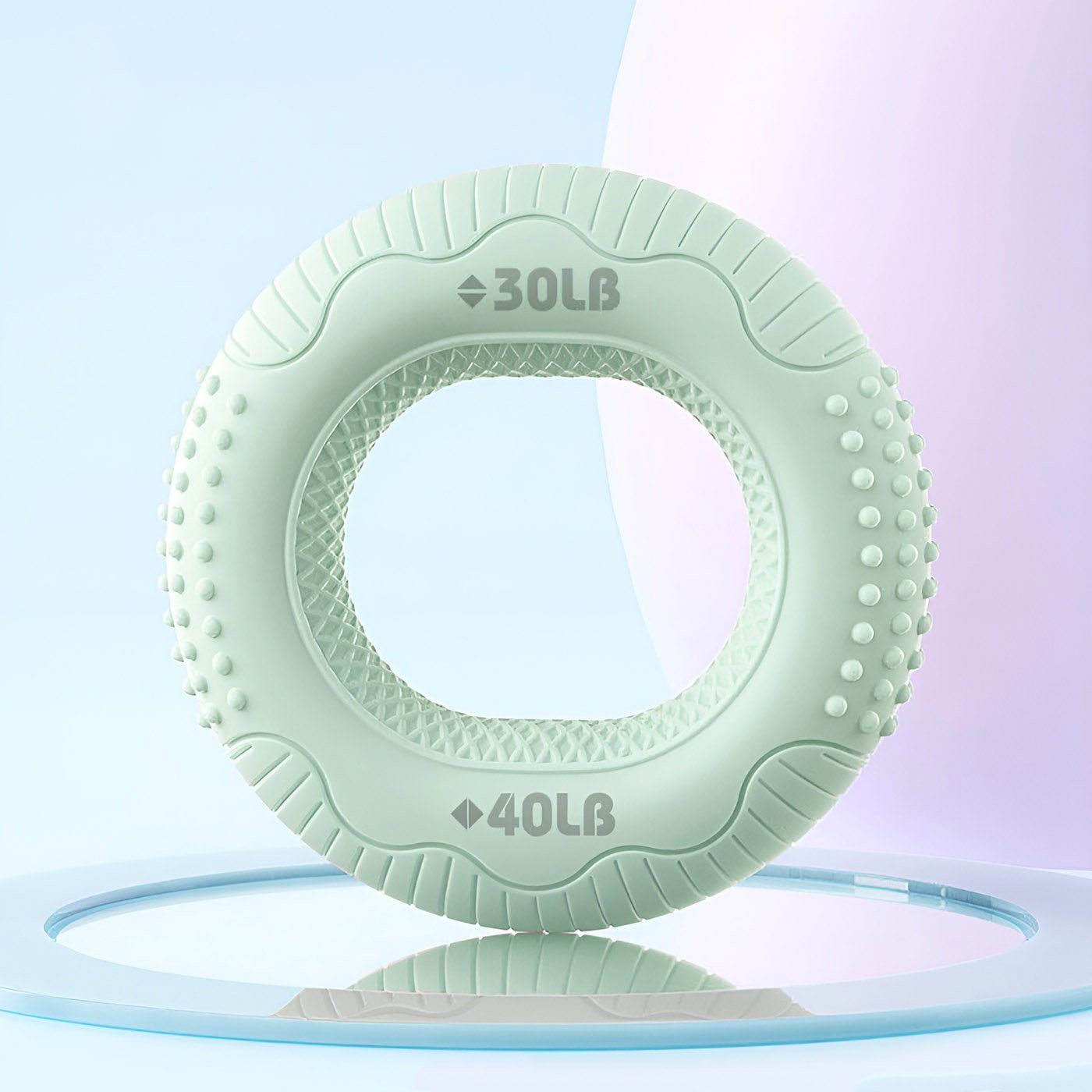 Green 30LB to 40LB dual-resistance hand grip strengthener ring for finger and forearm exercise.
