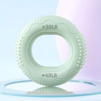 Green 30LB to 40LB dual-resistance hand grip strengthener ring for finger and forearm exercise.