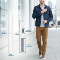 Man placing the compact cleaning pen into a pocket to demonstrate portability.